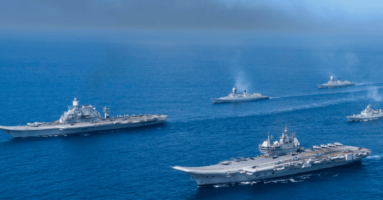 Indian Navy carrier battle group sailing in formation, representing the maritime capabilities driving India's Indo-Pacific Strategy.